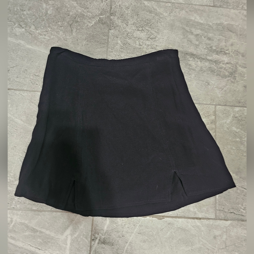 Black Mini Skirt With Two Side Slits In The Front